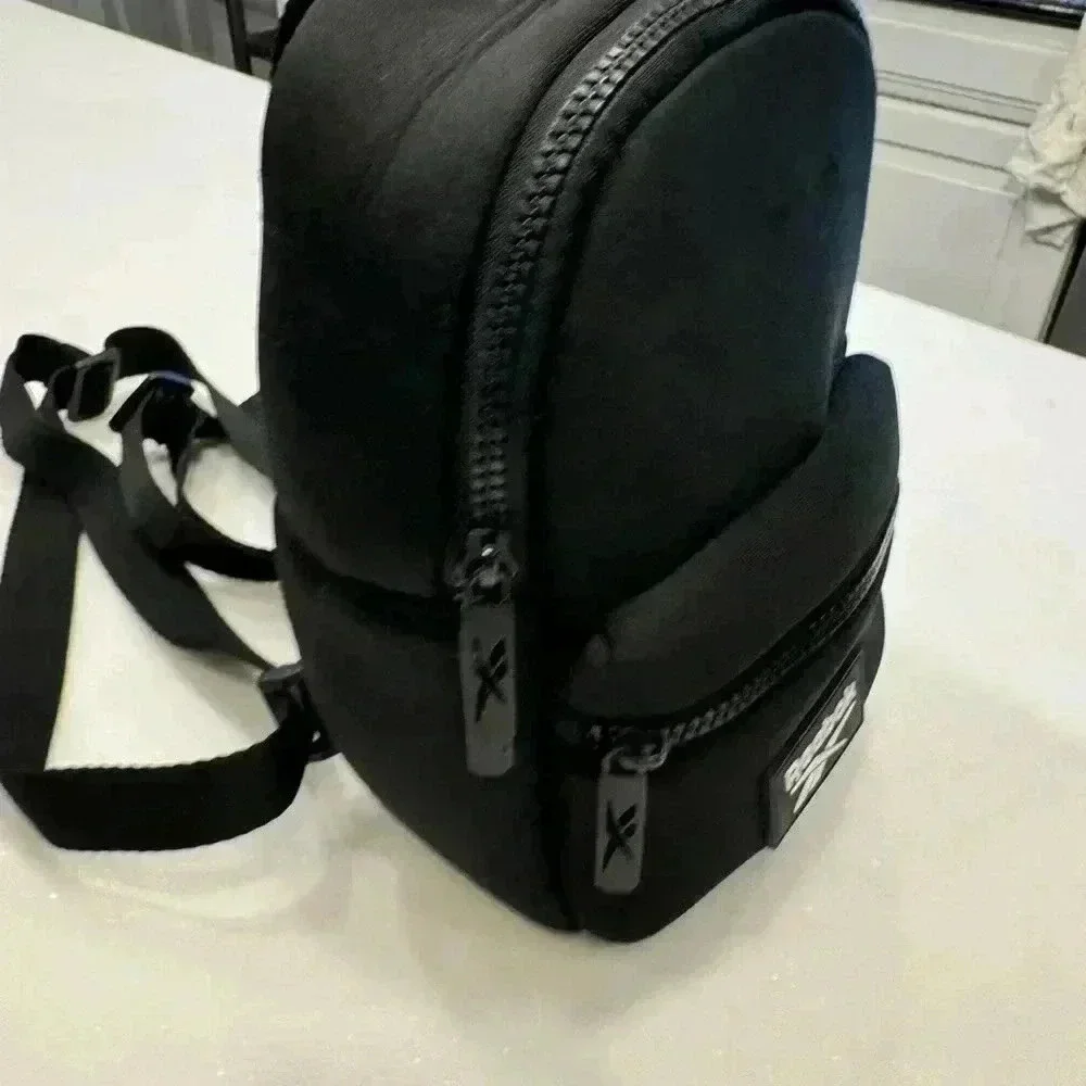 Reebok mini neoprene back pack adjustable straps front zip compartment